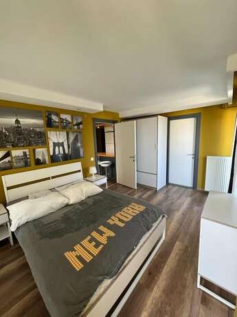 Imagen de la habitación del Deluxe Beach Residence. Foto 13