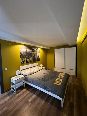 Imagen de la habitación del Deluxe Beach Residence. Foto 15