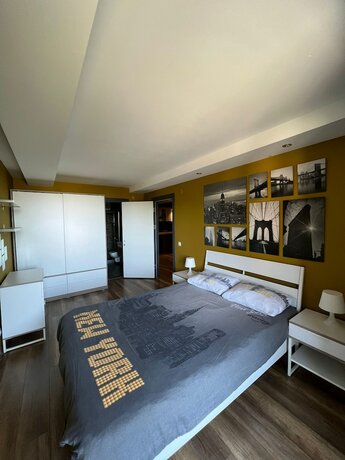 Imagen de la habitación del Deluxe Beach Residence. Foto 20