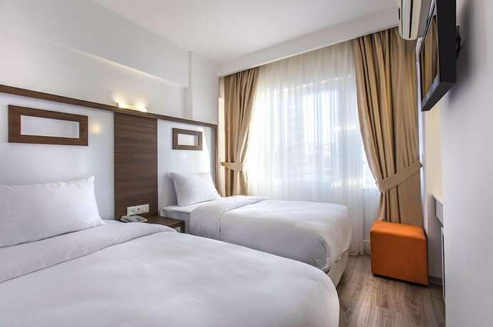 Imagen de la habitación del Demir Suit Hotel, Kusadasi. Foto 18