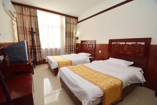 Imagen de la habitación del Dengfeng Shaolin Tourist Resort. Foto 5