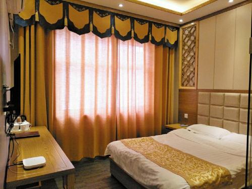 Imagen de la habitación del Dengfeng Shaolin Tourist Resort. Foto 7