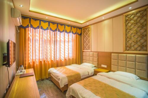 Imagen de la habitación del Dengfeng Shaolin Tourist Resort. Foto 9