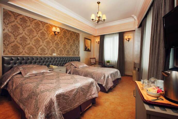 Imagen de la habitación del Deniz Otel. Foto 8