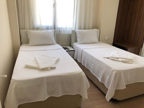 Imagen de la habitación del Deniz Otel, Geyikli. Foto 9