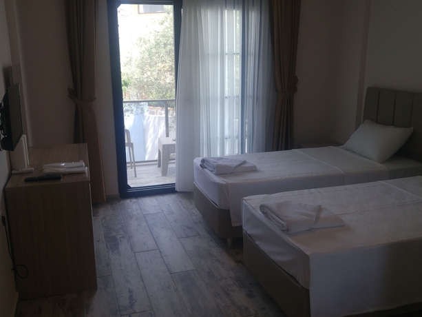 Imagen de la habitación del Deniz Otel, Seferihisar. Foto 15