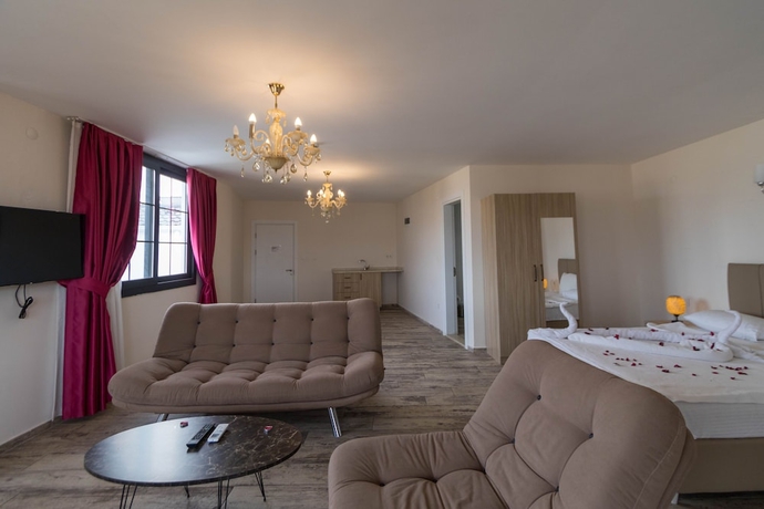 Imagen de la habitación del Deniz Otel, Seferihisar. Foto 18