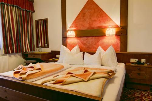 Imagen de la habitación del Der Br&uuml;ckenhof Ramsau. Foto 6