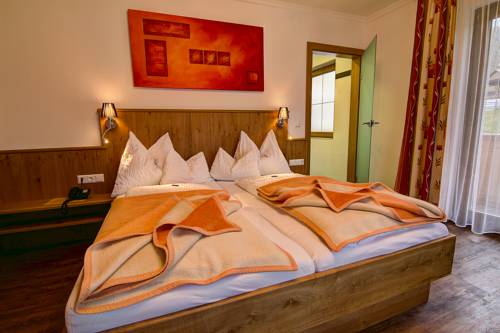 Imagen de la habitación del Der Br&uuml;ckenhof Ramsau. Foto 7