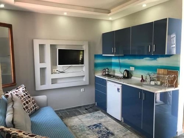 Imagen de la habitación del Derin Apart Hotel. Foto 7