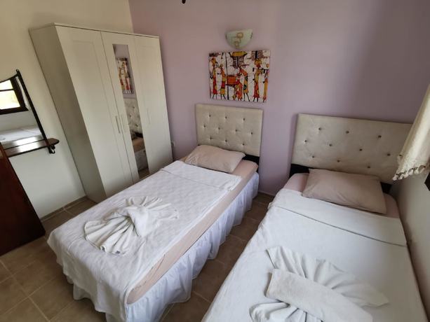Imagen de la habitación del Derin Apart Hotel. Foto 19