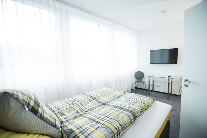 Imagen de la habitación del Design Sleepy Cologne. Foto 4
