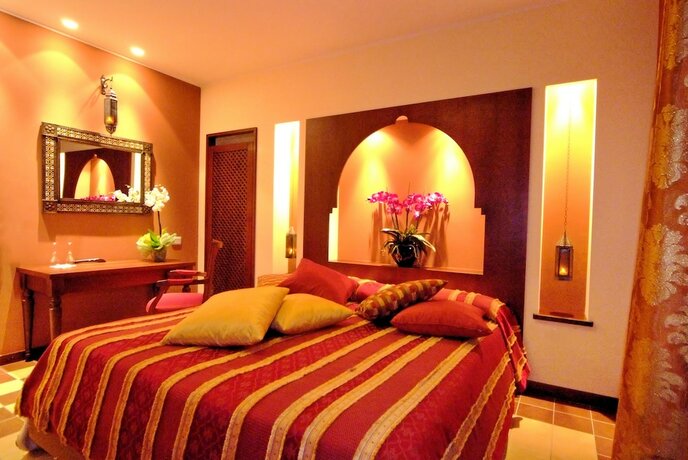 Imagen de la habitación del Design Suite Tirano. Foto 12