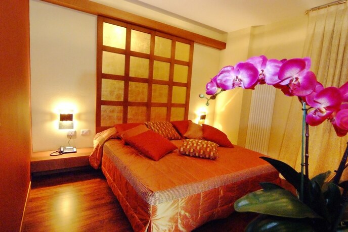 Imagen de la habitación del Design Suite Tirano. Foto 17