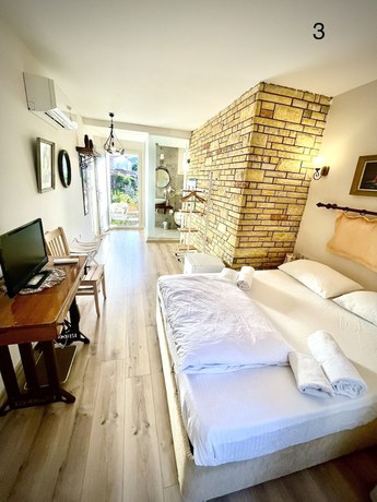 Imagen de la habitación del Destina Boutique Hotel. Foto 10