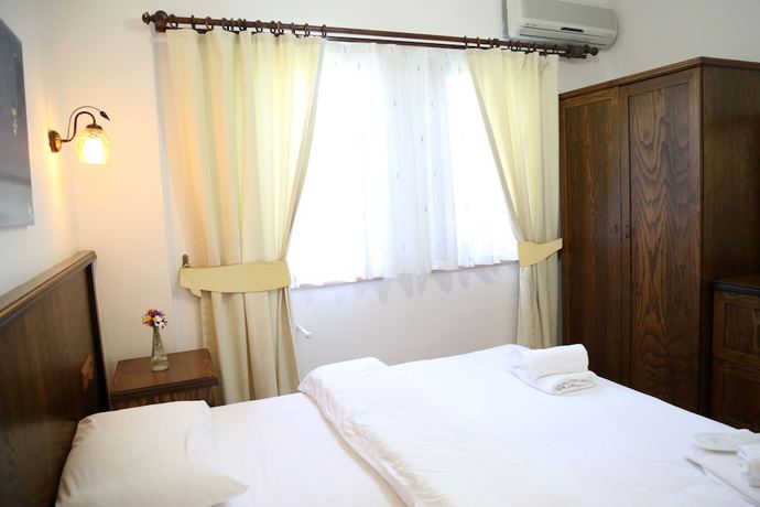 Imagen de la habitación del Destina Suit Hotel. Foto 11