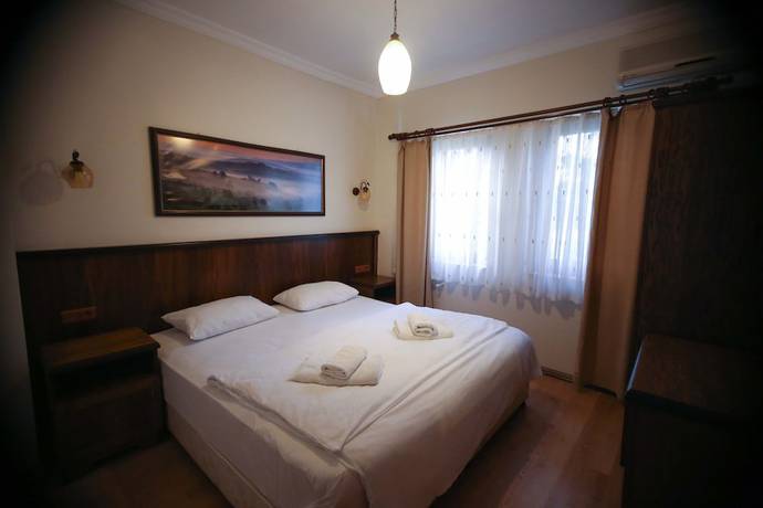 Imagen de la habitación del Destina Suit Hotel. Foto 13