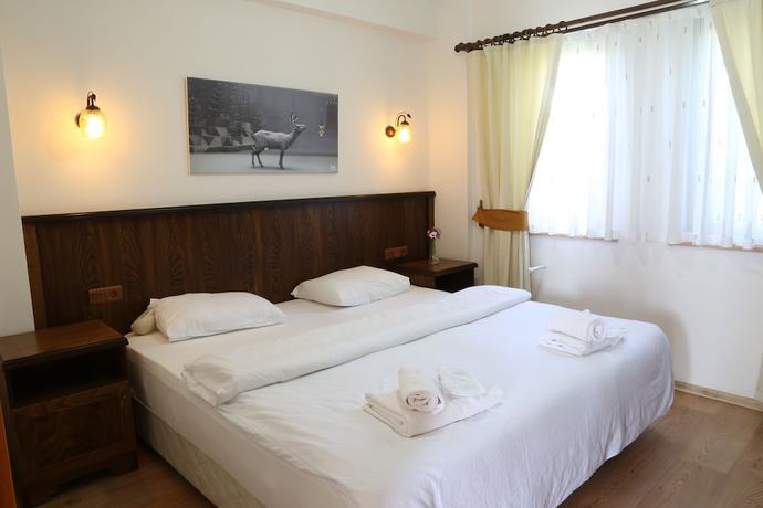 Imagen de la habitación del Destina Suit Hotel. Foto 20