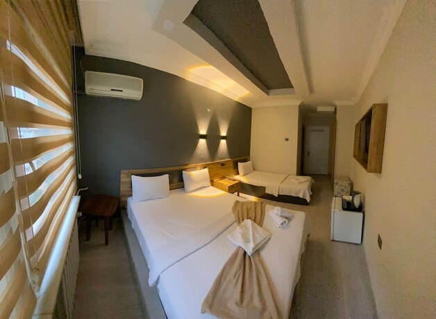 Imagen de la habitación del Deta Port Hotel. Foto 14