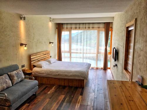 Imagen de la habitación del Deyishe Warm Night Lakeview Homestay. Foto 6