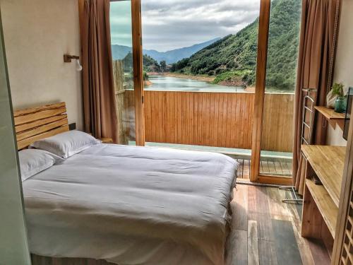 Imagen general del Deyishe Warm Night Lakeview Homestay. Foto 4