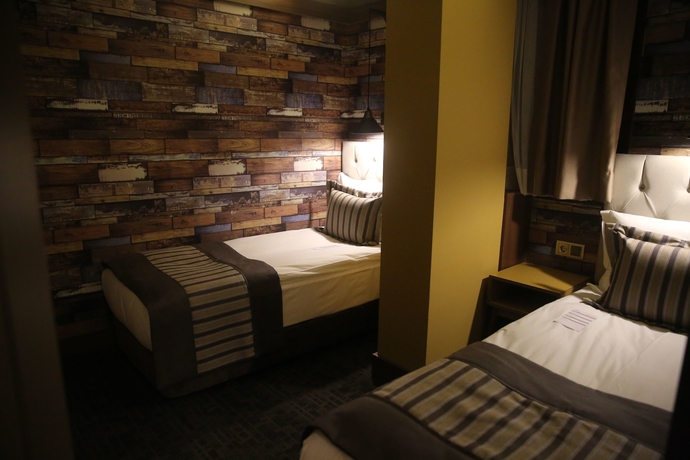 Imagen de la habitación del Diasos Otel Buca. Foto 6