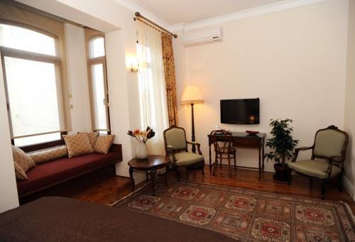 Imagen de la habitación del Dila Suites. Foto 31