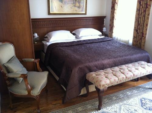 Imagen de la habitación del Dila Suites. Foto 32