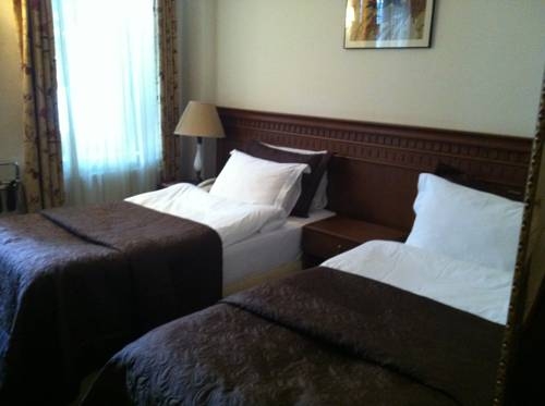Imagen de la habitación del Dila Suites. Foto 35