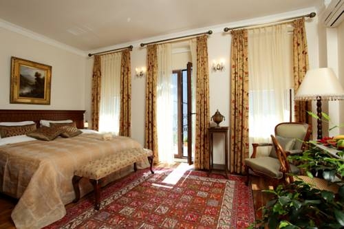 Imagen de la habitación del Dila Suites. Foto 37