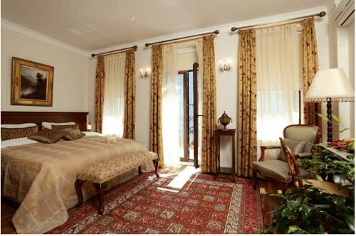 Imagen de la habitación del Dila Suites. Foto 38