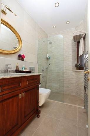 Imagen de la habitación del Dila Suites. Foto 39