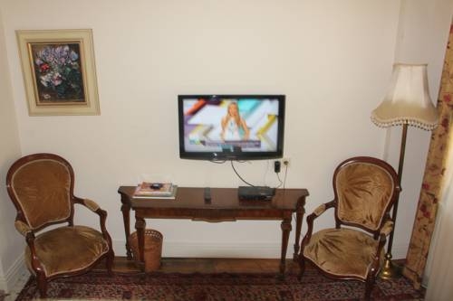Imagen de la habitación del Dila Suites. Foto 43
