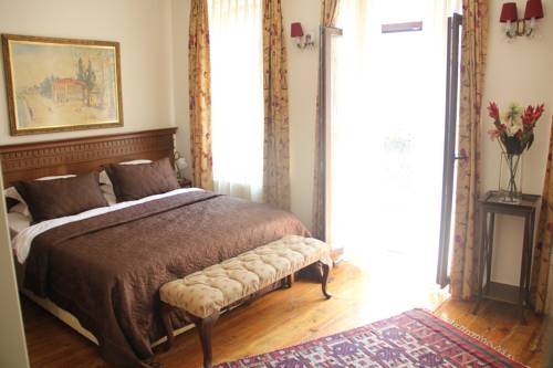 Imagen de la habitación del Dila Suites. Foto 44