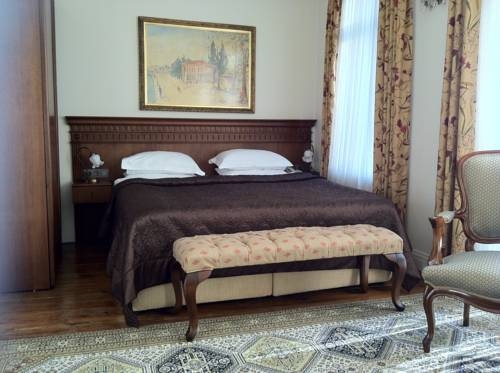 Imagen de la habitación del Dila Suites. Foto 48