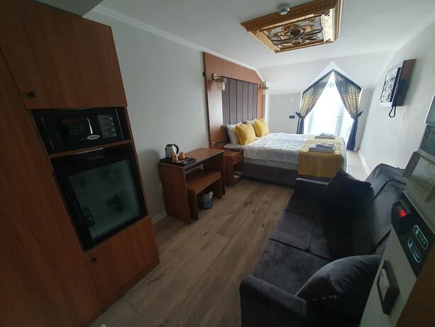 Imagen de la habitación del Dimora Gold Hotel. Foto 14
