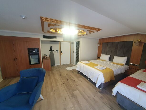 Imagen de la habitación del Dimora Gold Hotel. Foto 18