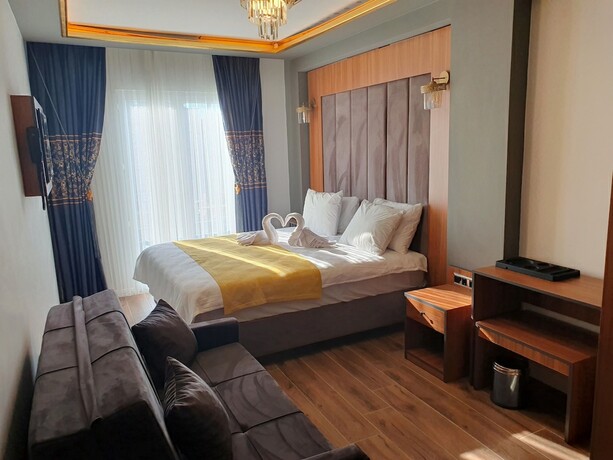 Imagen de la habitación del Dimora Gold Hotel. Foto 19