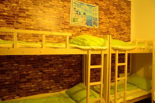 Imagen de la habitación del Distree Youth Hostel(wu Jia). Foto 3