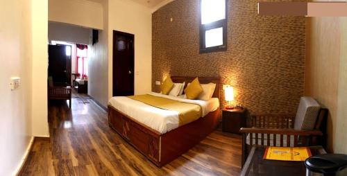 Imagen de la habitación del Divyansh Hotel. Foto 6