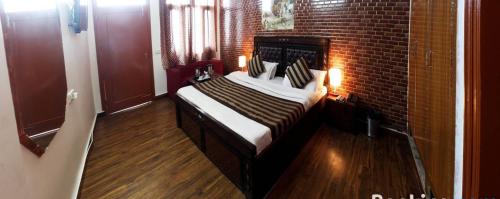 Imagen de la habitación del Divyansh Hotel. Foto 7