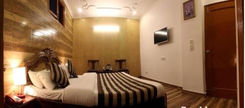 Imagen de la habitación del Divyansh Hotel. Foto 8
