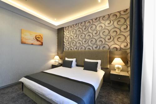 Imagen de la habitación del D'lux Boutique Hotel. Foto 8