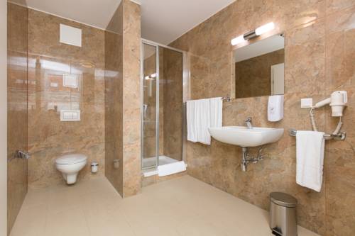 Imagen de la habitación del Dmg Apartments Hotel. Foto 2