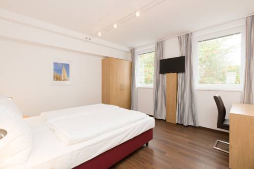 Imagen de la habitación del Dmg Apartments Hotel. Foto 4
