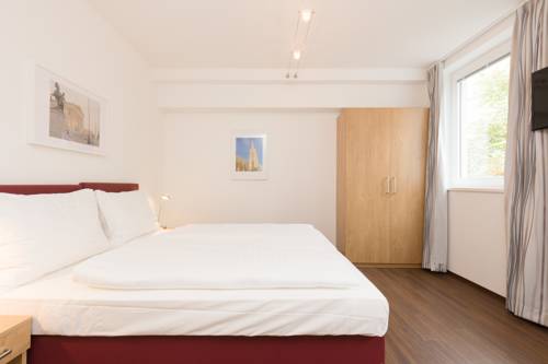 Imagen de la habitación del Dmg Apartments Hotel. Foto 5