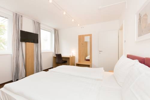 Imagen de la habitación del Dmg Apartments Hotel. Foto 6