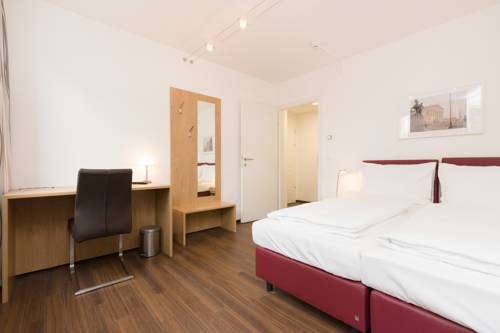 Imagen de la habitación del Dmg Apartments Hotel. Foto 7