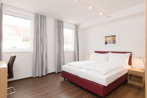 Imagen de la habitación del Dmg Apartments Hotel. Foto 8