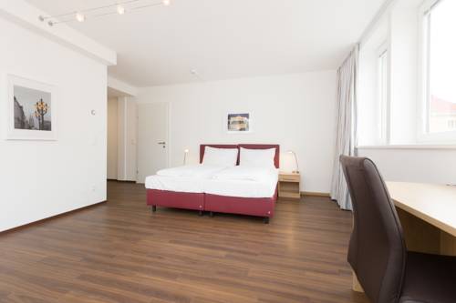 Imagen de la habitación del Dmg Apartments Hotel. Foto 9